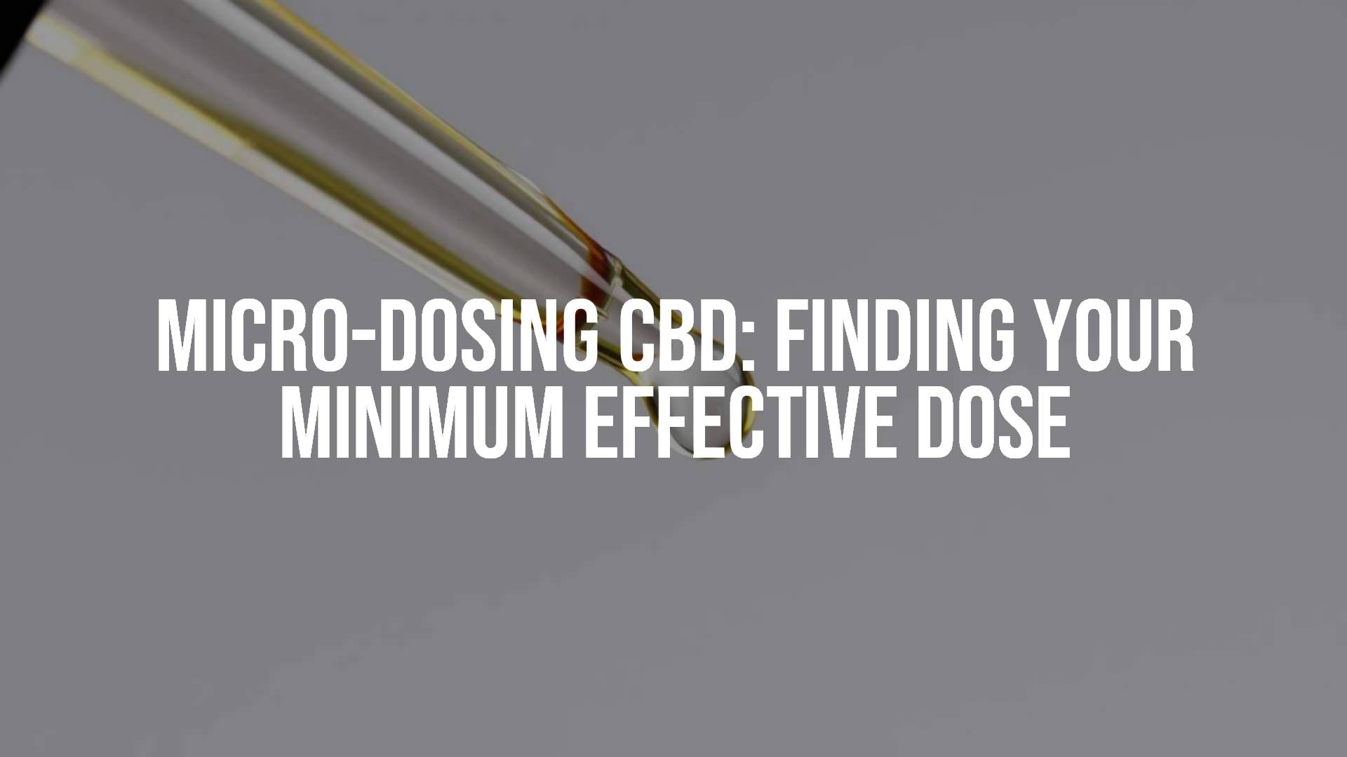 A close-up of small CBD oil droplets on a dropper, soft natural lighting, minimalist and clean style.