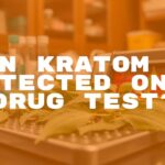 Kratom leaves and a drug test kit on a table, medical or laboratory setting, realistic.